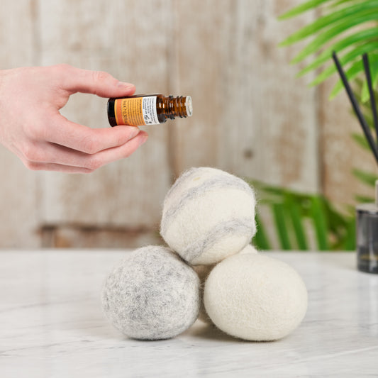 Blended wool dryer balls with essential oil